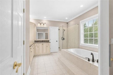 This exquisite four-sided blush brick estate is the epitome of - photo 27