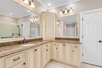 This exquisite four-sided blush brick estate is the epitome of - photo 29
