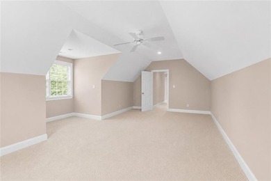 This exquisite four-sided blush brick estate is the epitome of - photo 34