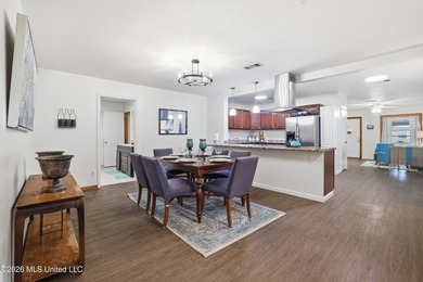 Welcome home to this surprisingly spacious 4 bedroom, 2 bath - photo 12