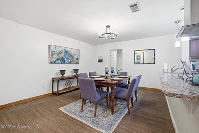 Welcome home to this surprisingly spacious 4 bedroom, 2 bath - photo 13