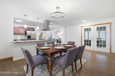 Welcome home to this surprisingly spacious 4 bedroom, 2 bath - photo 14