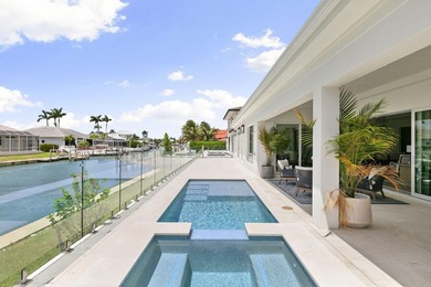 Just completed! New construction waterfront residence on Marco - photo 26