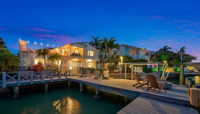 Perfectly positioned within the exclusive waterfront enclave of - photo 3