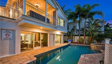 Perfectly positioned within the exclusive waterfront enclave of - photo 5