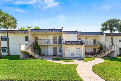 Beautifully renovated 2nd-floor corner unit in the highly - photo 2