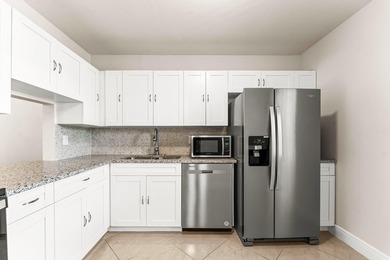 Beautifully renovated 2nd-floor corner unit in the highly - photo 8