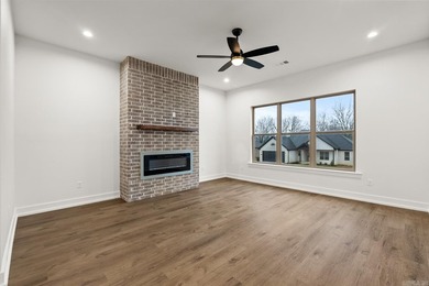 This beautifully constructed new home offers peaceful views of - photo 3