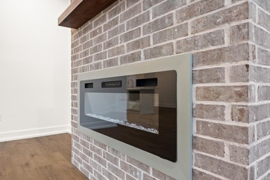 This beautifully constructed new home offers peaceful views of - photo 4