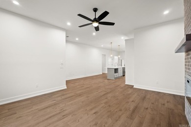 This beautifully constructed new home offers peaceful views of - photo 5