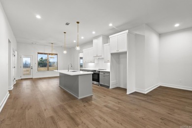 This beautifully constructed new home offers peaceful views of - photo 6