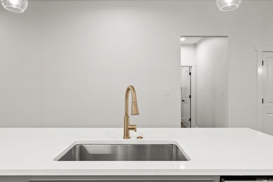This beautifully constructed new home offers peaceful views of - photo 7