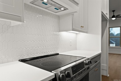 This beautifully constructed new home offers peaceful views of - photo 10