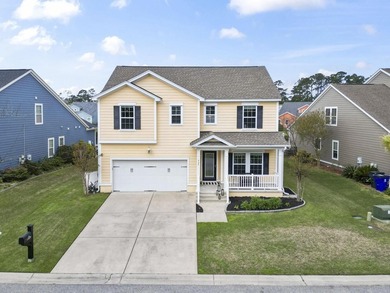 Four-bedroom, two-and-a-half-bathroom home with pond views and a - photo 1