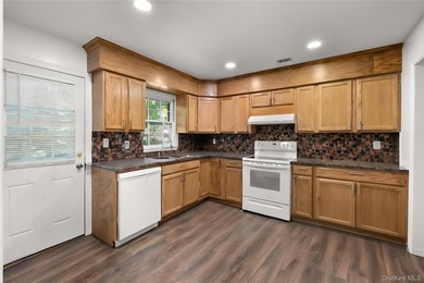 Nestled in the heart of coveted East Setauket, this charming - photo 5