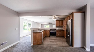 IMMACULATE Ranch on lot with Lake view from several angles! - photo 5