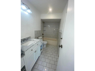 Well maintained, partially renovated townhouse located in the - photo 13
