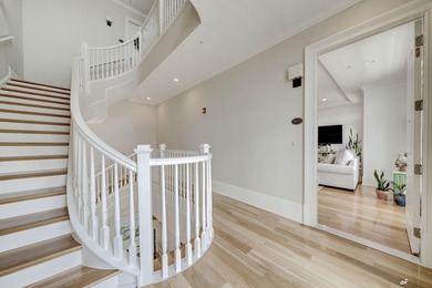 This extraordinary waterfront end unit condo, nestled in the - photo 3