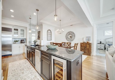 This extraordinary waterfront end unit condo, nestled in the - photo 8