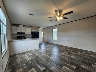 Find your place in the world at Eagle Estates, a well-maintained - photo 2