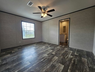 Find your place in the world at Eagle Estates, a well-maintained - photo 3