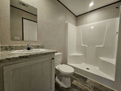 Find your place in the world at Eagle Estates, a well-maintained - photo 4