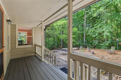 Nestled in a private, picturesque setting, this exceptional - photo 4