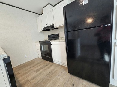 Own your own home in a quiet, well-maintained neighborhood! This - photo 3