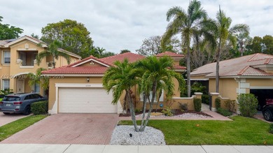 Beautiful one story home in Heron Bay COMPLETELY RENOVATED with - photo 1