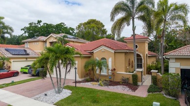 Beautiful one story home in Heron Bay COMPLETELY RENOVATED with - photo 2