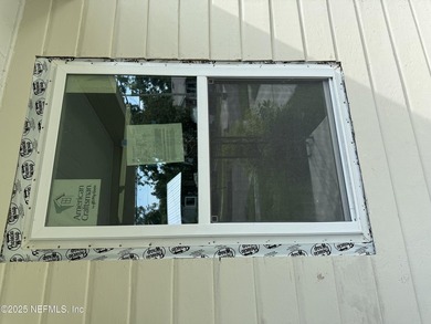 A charming fixer upper in Murray Hill! Come and make this lovely - photo 5