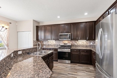 Welcome to this spacious and beautifully updated waterfront home - photo 6