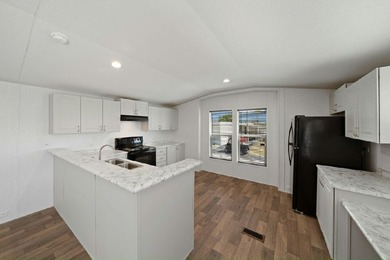 Experience the ease of living at Tall Pines, a 55+ Age Qualified - photo 3