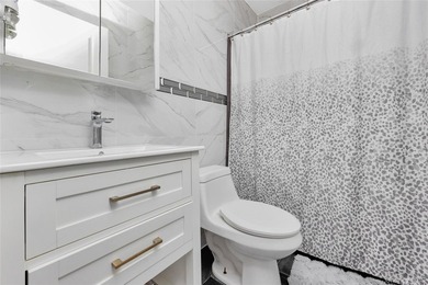 Built in 2021, this legal two-family brick duplex offers a rare - photo 13