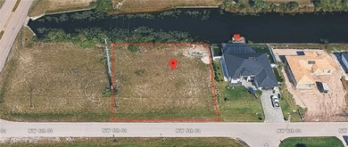 Build your dream home on this oversized .36-acre canal - photo 2