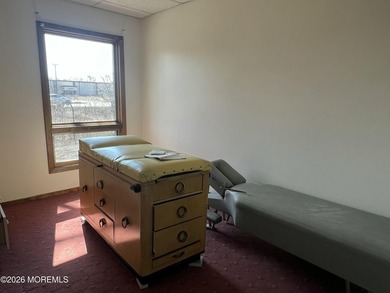 Available a one-story end unit office condo. The unit features - photo 8