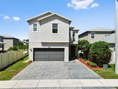 Welcome to this beautiful waterfront 2-story home in the - photo 1