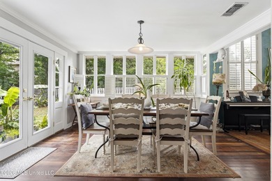 Tucked beneath a canopy of majestic live oaks on coveted Second - photo 12