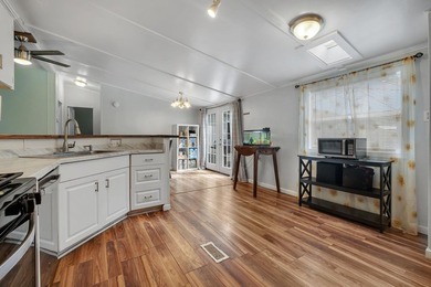 Welcome home to this Well maintained 3-bedroom, 2-bath mobile - photo 12