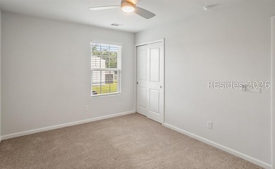 Welcome to 1 Toxaway Lane, where modern comfort meets Lowcountry - photo 17