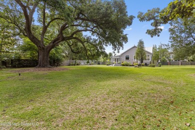 Tucked beneath a canopy of majestic live oaks on coveted Second - photo 39