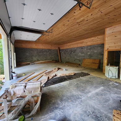 Experience modern lakeside living in this brand-new construction - photo 2