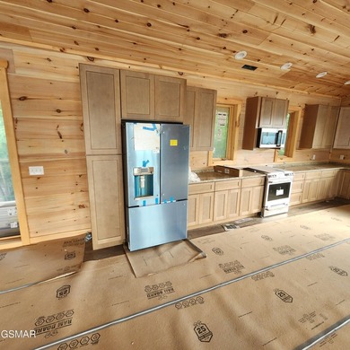 Experience modern lakeside living in this brand-new construction - photo 10
