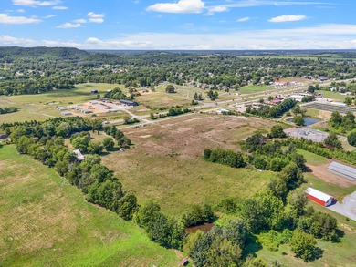 Discover 20 +/- acre of land poised for business development in - photo 11