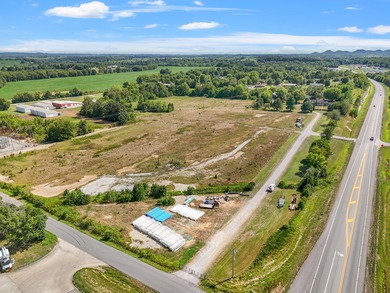 Discover 20 +/- acre of land poised for business development in - photo 13