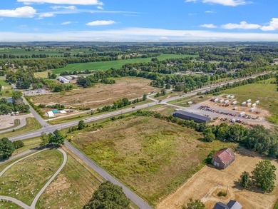 Discover 20 +/- acre of land poised for business development in - photo 15