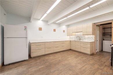 Located in the heart of The Village! This unique multi-unit - photo 16