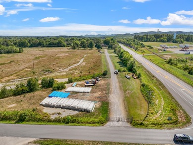 Discover 20 +/- acre of land poised for business development in - photo 16