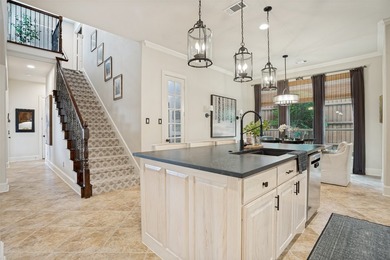 Tucked away on a beautifully landscaped cul-de-sac lot in the - photo 3