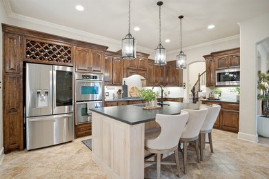 Tucked away on a beautifully landscaped cul-de-sac lot in the - photo 4